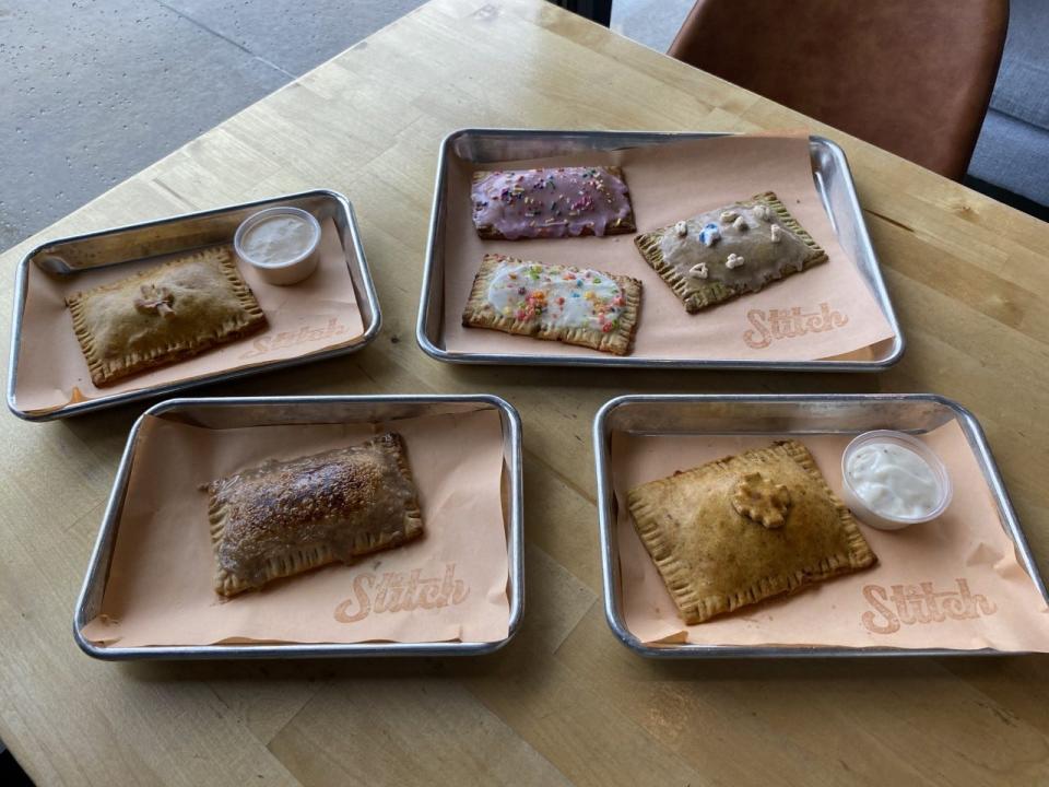 A selection of tarts at Stitch Cafe. Top left, jalapeno cactus; top center, strawberry-prickly; center, Bam! Bam!; top right, March seasonal; bottom right, chorizo, egg and cheese; bottom left, brown sugar.