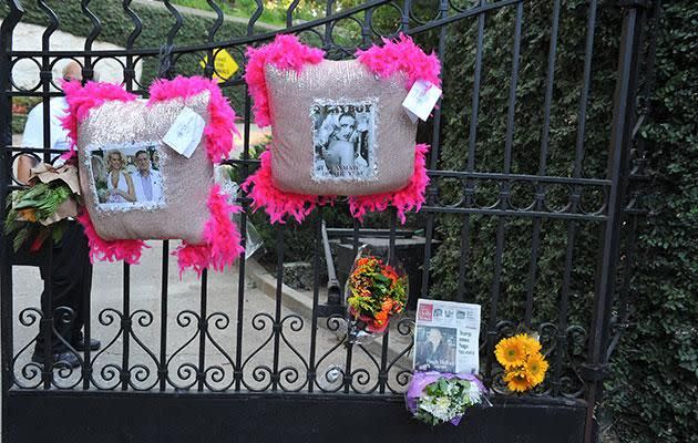 Fans have left flowers and cards outside the Playboy Mansion mourning Hugh following his death. Source: Getty