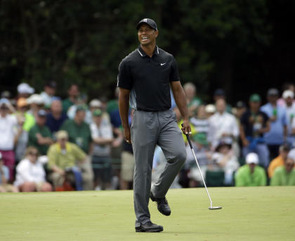 Tiger Woods reacts to his missed putt on the 15th hole during the second round of the Masters golf tournament Friday, April 10, 2015, in Augusta, Ga. (AP Photo/Matt Slocum)