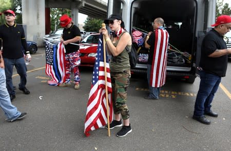 Supporters prepare to depart a Proud Boys rally in Portland, Oregon