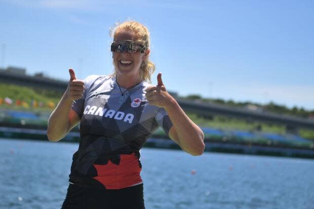 Laurence Vincent Lapointe of Trois-Rivieres, Que., celebrates after capturing silver in the women's canoe single 200-metre final on Thursday in Tokyo. (AFP via Getty Images - image credit)