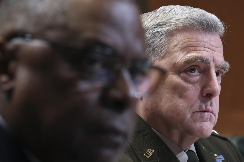 Chairman of the Joint Chiefs of Staff Gen. Mark Milley, right, and Secretary of Defense Lloyd Austin testify before the Senate Appropriations Committee Subcommittee on Defense, Tuesday, May 3, 2022 on Capitol Hill in Washington. (Win McNamee/Pool photo via AP)