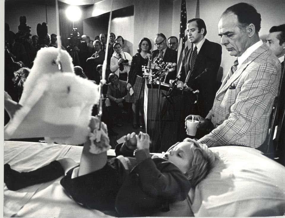 Sen. Joe Biden addresses the media from his sons' hospital room after been sworn into the U.S. Senate. Days before Biden lost his wife, Neilia, and baby daughter, Naomi, in a car crash and his two sons were badly injured. Jan. 5, 1973