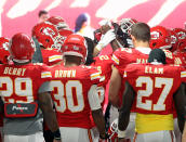 KANSAS CITY, MO - DECEMBER 02: Kansas City Chiefs players huddle in prayer in the tunnel to the field prior to the game against the Carolina Panthers at Arrowhead Stadium on December 2, 2012 in Kansas City, Missouri. (Photo by Jamie Squire/Getty Images)