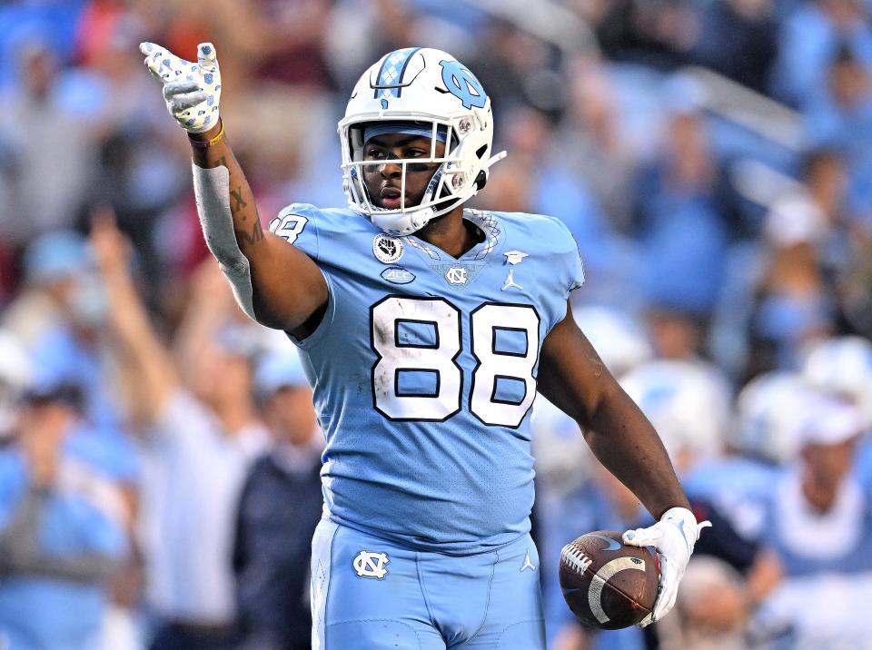 Kamari Morales of the North Carolina Tar Heels signals after making a first down catch against the Virginia Tech Hokies during the second half of their game at Kenan Memorial Stadium on October 01, 2022 in Chapel Hill, North Carolina. Morales played high school football at Leon.
