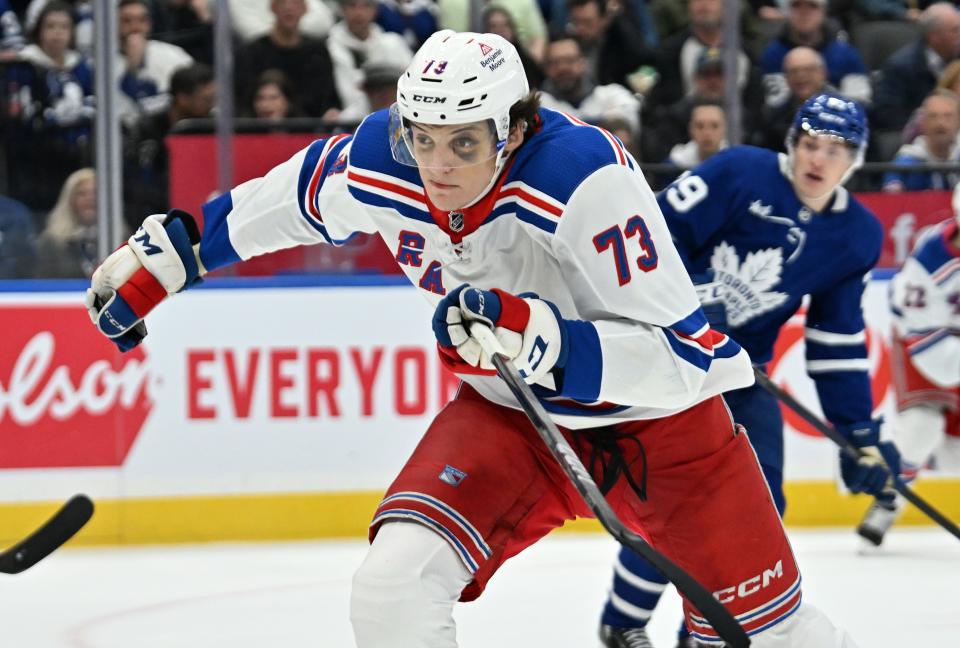 Mar 2, 2024; Toronto, Ontario, CAN; New York Rangers forward Matt Rempe (73) pursues the play against the Toronto Maple Leafs in the third period at Scotiabank Arena.