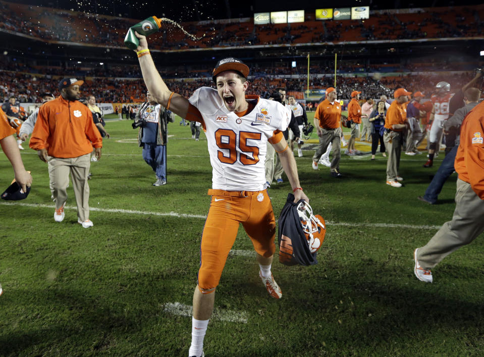 Clemson Tigers punter Andy Teasdall (95) celebrates after Clemson defeated Ohio State 40-35 the Orange Bowl NCAA college football game, Saturday, Jan. 4, 2014, in Miami Gardens, Fla. (AP Photo/Lynne Sladky)