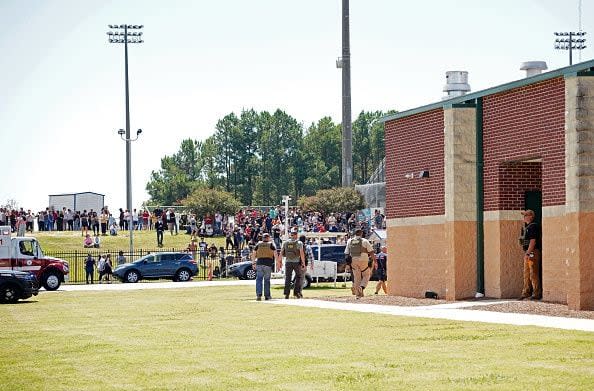 WINDER, GEORGIA - SEPTEMBER 4: Students wait to be picked up by their parents after a shooting at Apalachee High School on September 4, 2024 in Winder, Georgia. Multiple fatalities and injuries have been reported and a suspect is in custody according to authorities. (Photo by Megan Varner/Getty Images)