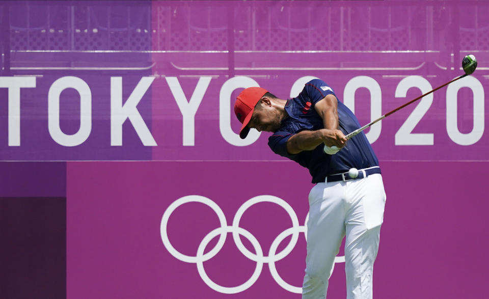 CORRECTS LAST NAME TO SCHAUFFELE FROM SHAUFFELE - Xander Schauffele of the United States hits a tee shot on the first hole during the final round of the men's golf event at the 2020 Summer Olympics on Sunday, Aug. 1, 2021, in Kawagoe, Japan. (AP Photo/Matt York)