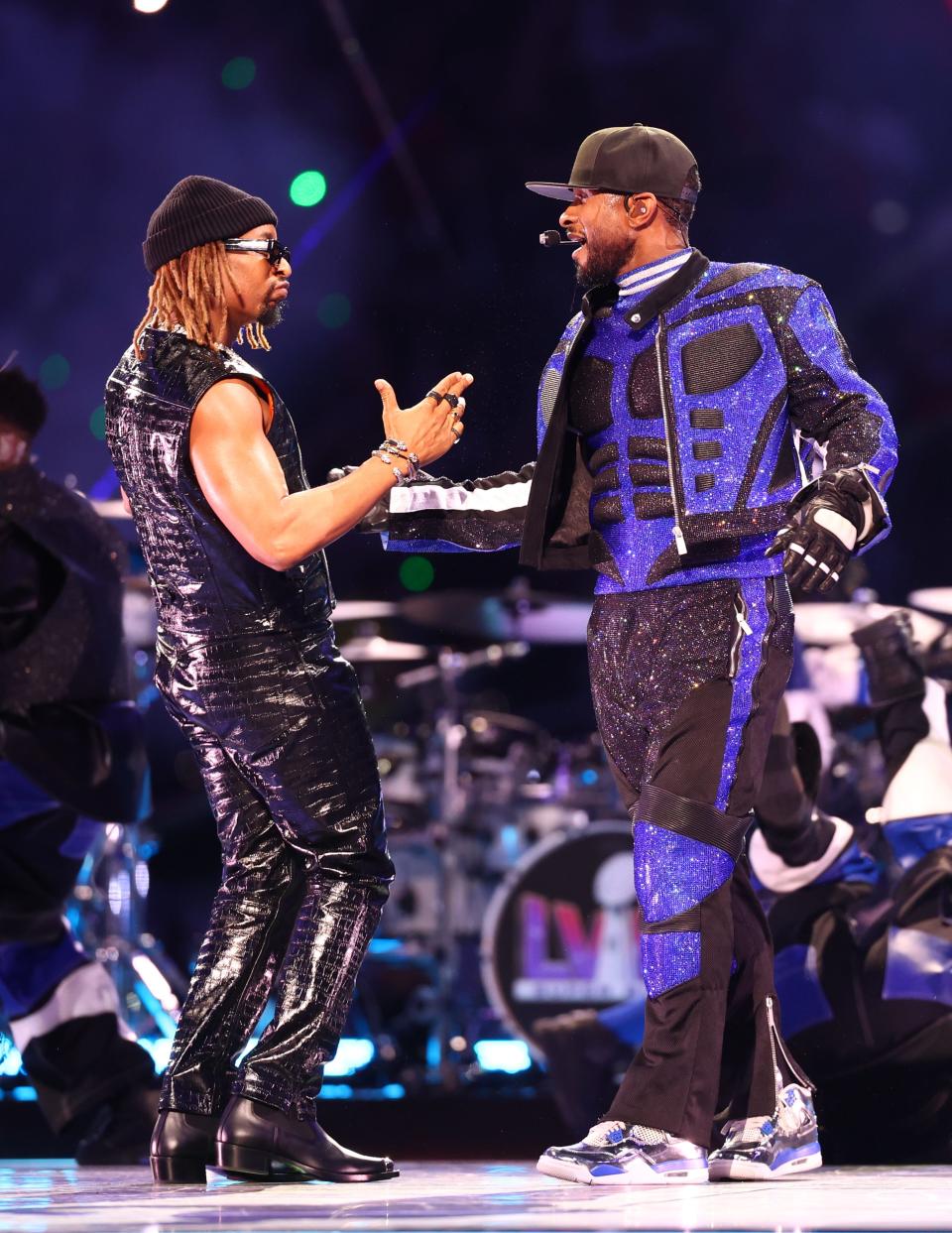 Usher and Lil Jon perform at halftime of Super Bowl LVIII between the Kansas City Chiefs and the San Francisco 49ers at Allegiant Stadium.