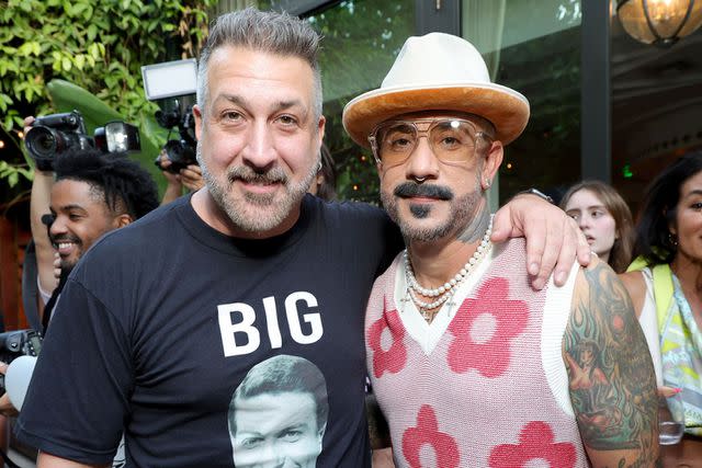 <p>Kevin Mazur/Getty </p> Joey Fatone (left) and AJ McLean at the We The Best Foundation Golf Classic VIP Reception at The Swan in Miami in July 2023