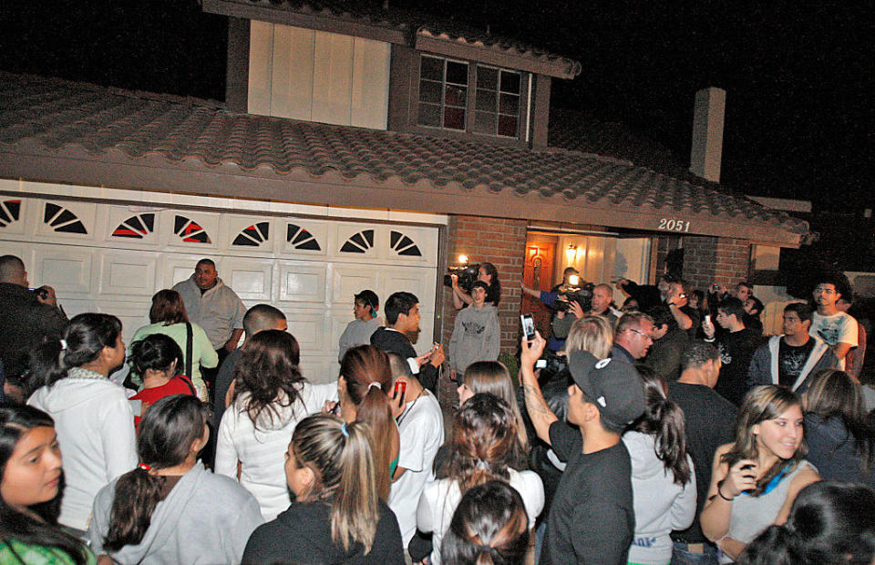 a crowd of people outside Nadya Suleman's house