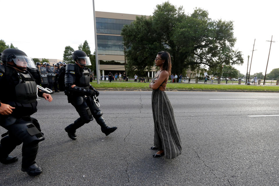 Protestor Ieshia Evans is approached by law enforcement near the headquarters of the Baton Rouge Police Department in Baton Rouge, Louisiana, U.S. July 9, 2016.   REUTERS/Jonathan Bachman          SEARCH "#BLACK LIVES MATTER" FOR THIS STORY. SEARCH "THE WIDER IMAGE" FOR ALL STORIES.