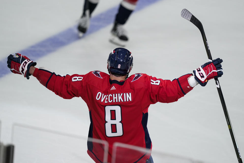 Washington Capitals left wing Alex Ovechkin (8) celebrates his second goal in the third period in an NHL hockey game against the New York Rangers, Wednesday, Oct. 13, 2021, in Washington. Ovechkin's goal gives him 732, and fifth place on the NHL goals list. The Capitals won 5-1. (AP Photo/Alex Brandon)