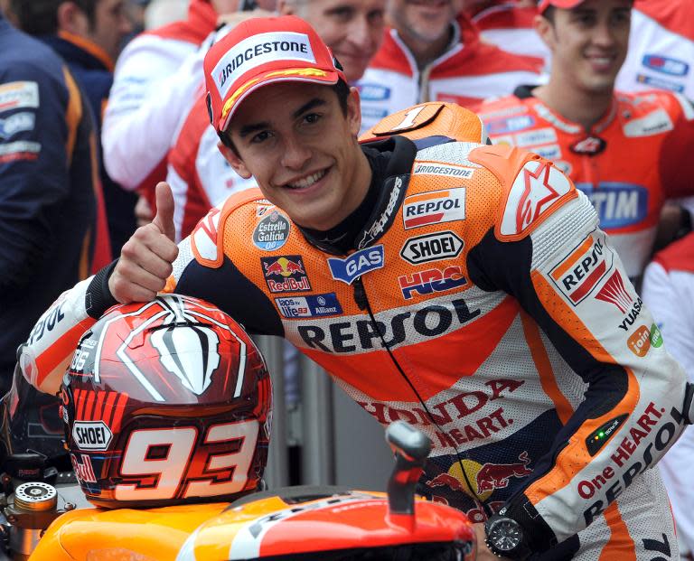 Spain's rider Marc Marquez clocked pole position during the qualifying practice session of the MotoGP Grand Prix, on May 16, 2015 in Le Mans, France