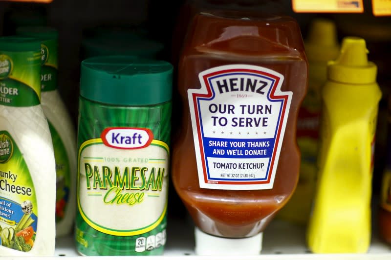 A Heinz Ketchup bottle and a bottle of Kraft parmesan cheese are displayed in a grocery store in New York March 25, 2015. REUTERS/Eduardo Munoz