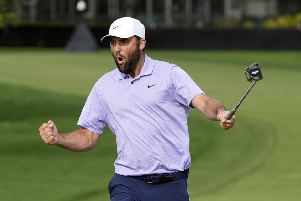 Scottie Scheffler celebrates after a birdie putt on the 15th green during the final round of the Arnold Palmer Invitational golf tournament Sunday, March 10, 2024, in Orlando, Fla. (AP Photo/John Raoux)