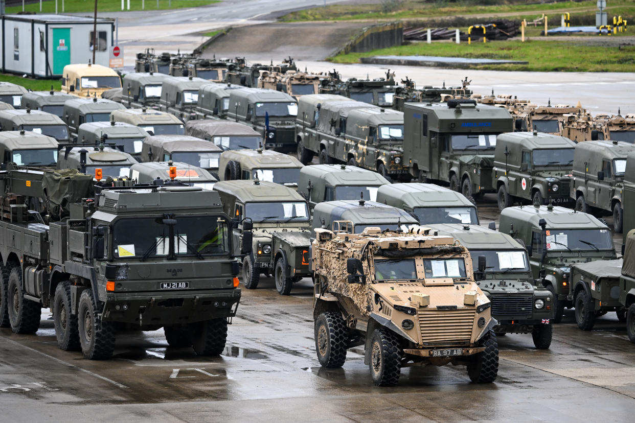 MARCHWOOD, ENGLAND - FEBRUARY 13: Military vehicles are loaded on to the ship Anvil Point at Sea Mounting Centre, on February 13, 2024 in Marchwood, England. 1,500 UK troops and 600 vehicles are joining NATO allies for exercises Brilliant Jump 2 and Polish Dragon, as part of the broader NATO effort named Steadfast Defender 2024. This initiative aims to enhance the alliance's ability to prevent and defend against potential threats. From January to May 2024, 16,000 British soldiers are participating in Europe, making it NATO's largest exercise in decades. The focus is on reinforcing the alliance, improving cooperation, and deploying forces in Europe. (Photo by Finnbarr Webster/Getty Images)