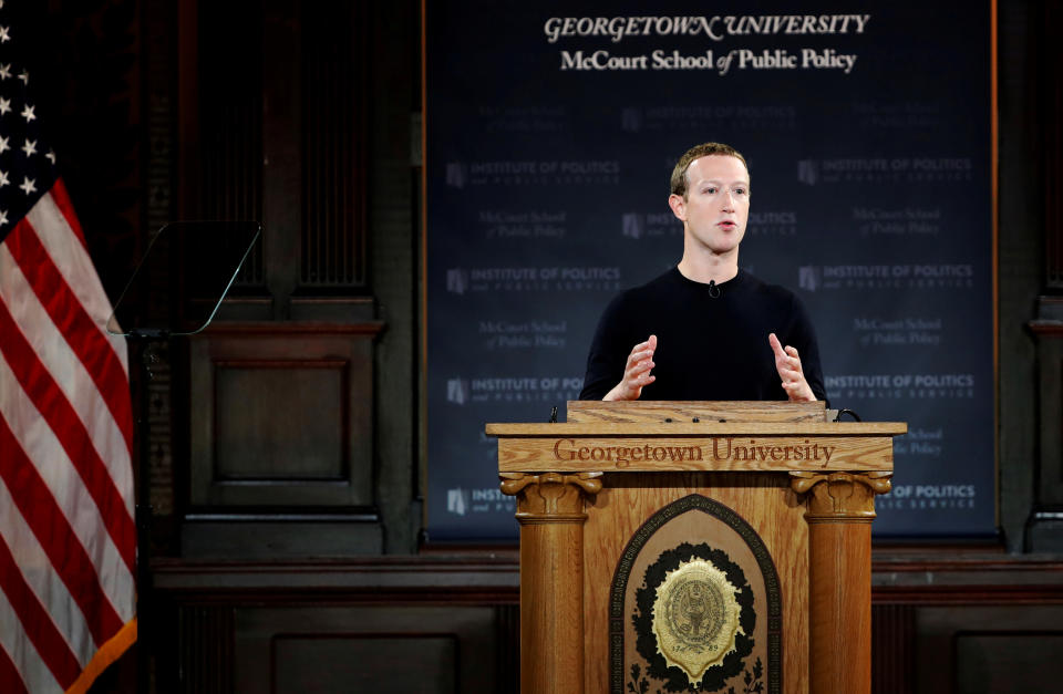 Facebook Chairman and CEO Mark Zuckerberg addresses the audience on "the challenges of protecting free speech while combating hate speech online, fighting misinformation, and political data privacy and security," at a forum hosted by Georgetown University's Institute of Politics and Public Service (GU Politics) and the McCourt School of Public Policy in Washington, U.S., October 17, 2019. REUTERS/Carlos Jasso