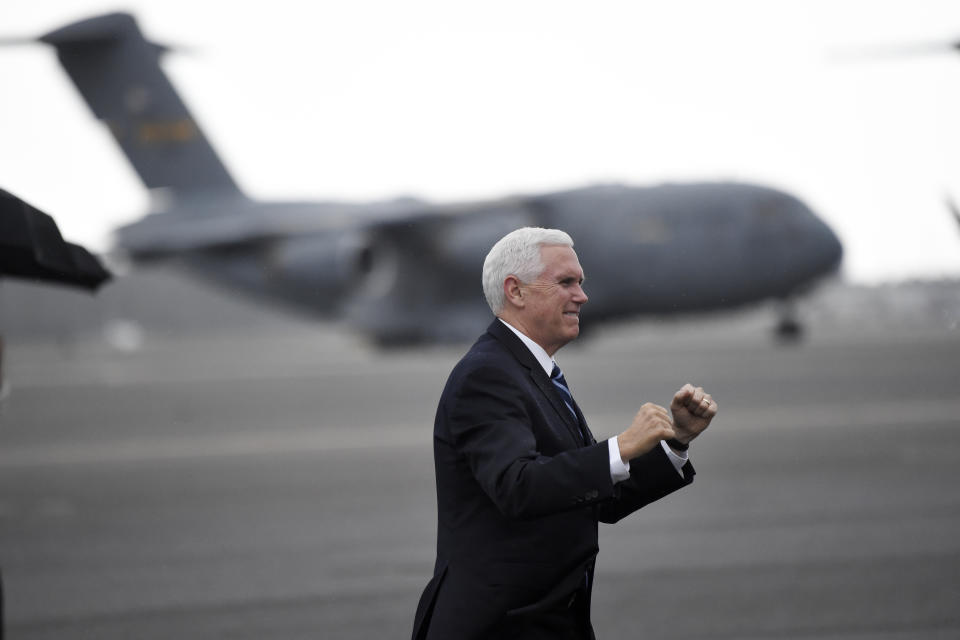 Vice President Mike Pence arrives at Joint Base Charleston in North Charleston, S.C., on Thursday, Feb. 13, 2020. (AP Photo/Meg Kinnard