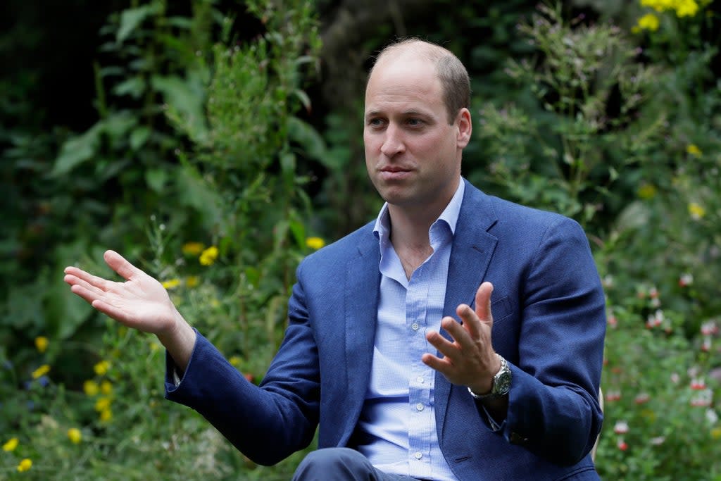 The Duke of Cambridge speaks with service users during a visit to the Garden House part of the Peterborough Light Project, a charity which offers advice and support to rough sleepers (Kirsty Wigglesworth/PA) (PA Archive)