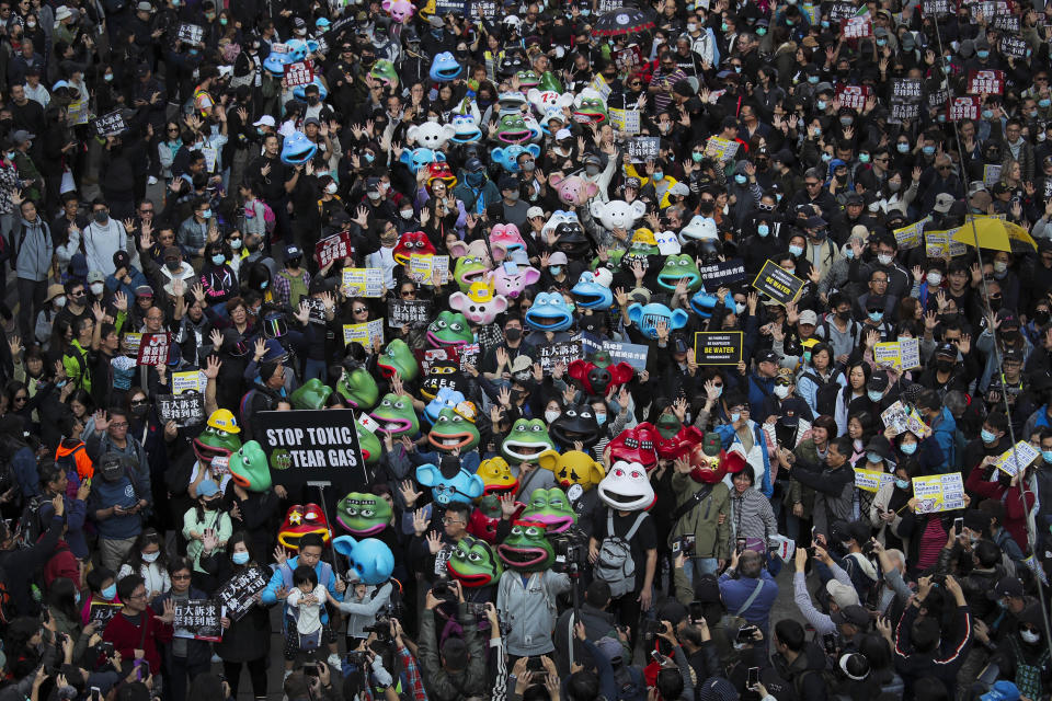 FILE - Pro-democracy protesters take part in a march in Hong Kong, Sunday, Dec. 8, 2019. The recent wave of protests against China's anti-virus restrictions was a ray of hope for some supporters of Hong Kong's own pro-democracy movement after local authorities stifled it using a national security law enacted in 2020, but not everyone agrees. (AP Photo/Kin Cheung, File)