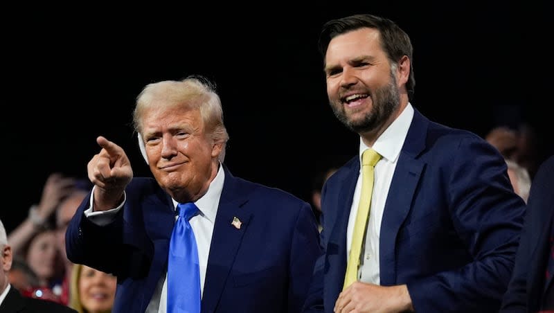 Republican presidential candidate former President Donald Trump and Republican vice presidential candidate Sen. JD Vance, R-Ohio, attend the 2024 Republican National Convention at the Fiserv Forum, Tuesday, July 16, 2024, in Milwaukee.