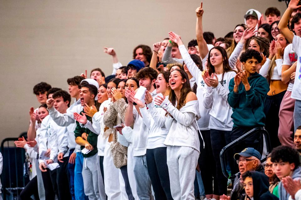 Dartmouth fans celebrate the MIAA State Tournament victory over Bedford.