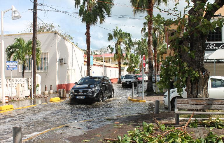 Streets are flooded following hurricane Gonzola on the French Caribbean island of Saint Martin on October 14, 2014, before the storm headed to Bermuda