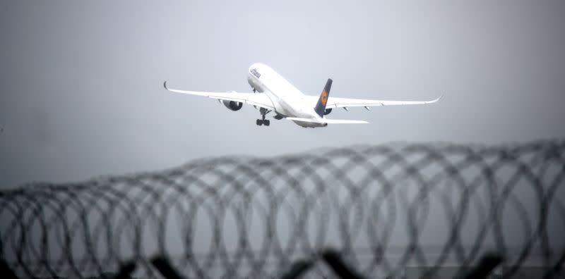 FILE PHOTO: An Airplane of German carrier Lufthansa takes off from Munich International Airport