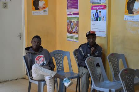 Patients watch television at Nairobi Outreach Services Trust (NOSET) in Nairobi, Kenya, July 13, 2016. REUTERS/Neha Wadekar