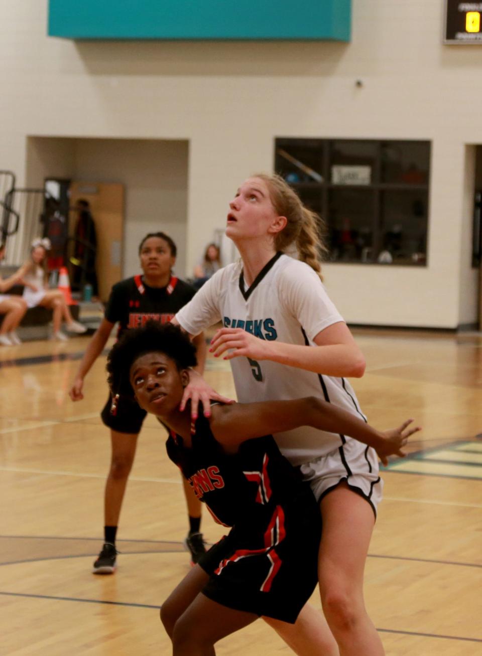 Islands High's Veronica Sierzant eyes a rebound over Jenkins High's Kaiya Bryant.