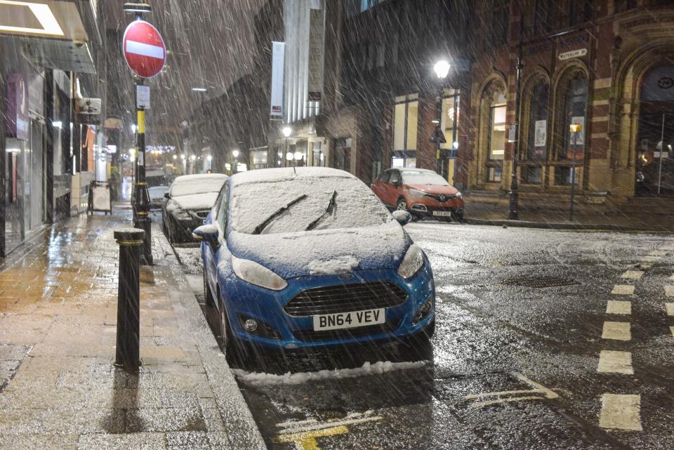 <p>Snow covered cars on Waterloo Street in Birmingham city centre. Heavy snow has hit Birmingham with blizzard conditions. The city had hours of rain beforehand meaning a lot is turning to slush but causing hazardous driving conditions. (Michael Scott/Caters News) </p>