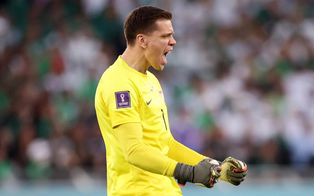 Wojciech Szczesny of Poland celebrates his side's first goal scored by Piotr Zielinski (not pictured) during the FIFA World Cup Qatar 2022 Group C match between Poland and Saudi Arabia at Education City Stadium on November 26, 2022 in Al Rayyan, Qatar - Hector Vivas - FIFA/FIFA via Getty Images