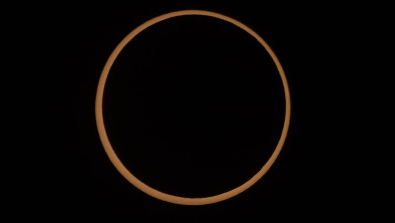 An annular solar eclipse is pictured in Torrey, Wayne County, Utah, on Saturday, Oct. 14, 2023. A phenomenon known as the “ring of fire” is visible because of the way the sun’s edges perfectly surround the moon.