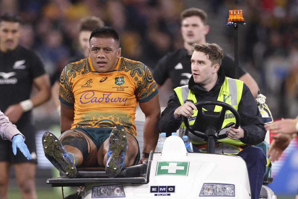 Australia's Allan Alaalatoa is driven off the field after being injured during their Bledisloe Cup rugby union test match against New Zealand in Melbourne, Australia, Saturday, July 29, 2023. (AP Photo/Hamish Blair)