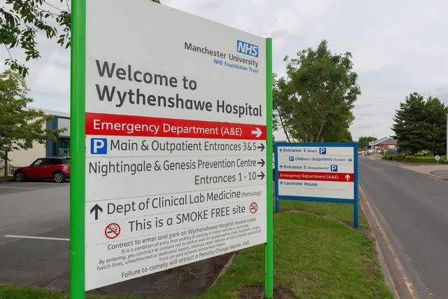 <p>Alamy</p> A photo of the Wythenshawe Hospital sign