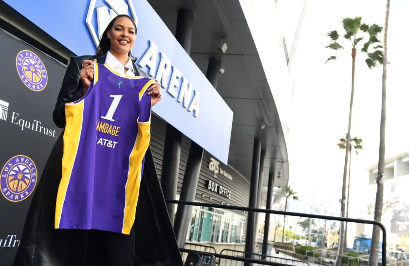 Los Angeles, California February 23 2022: New Sparks player Liz Cambage holds her jersey.