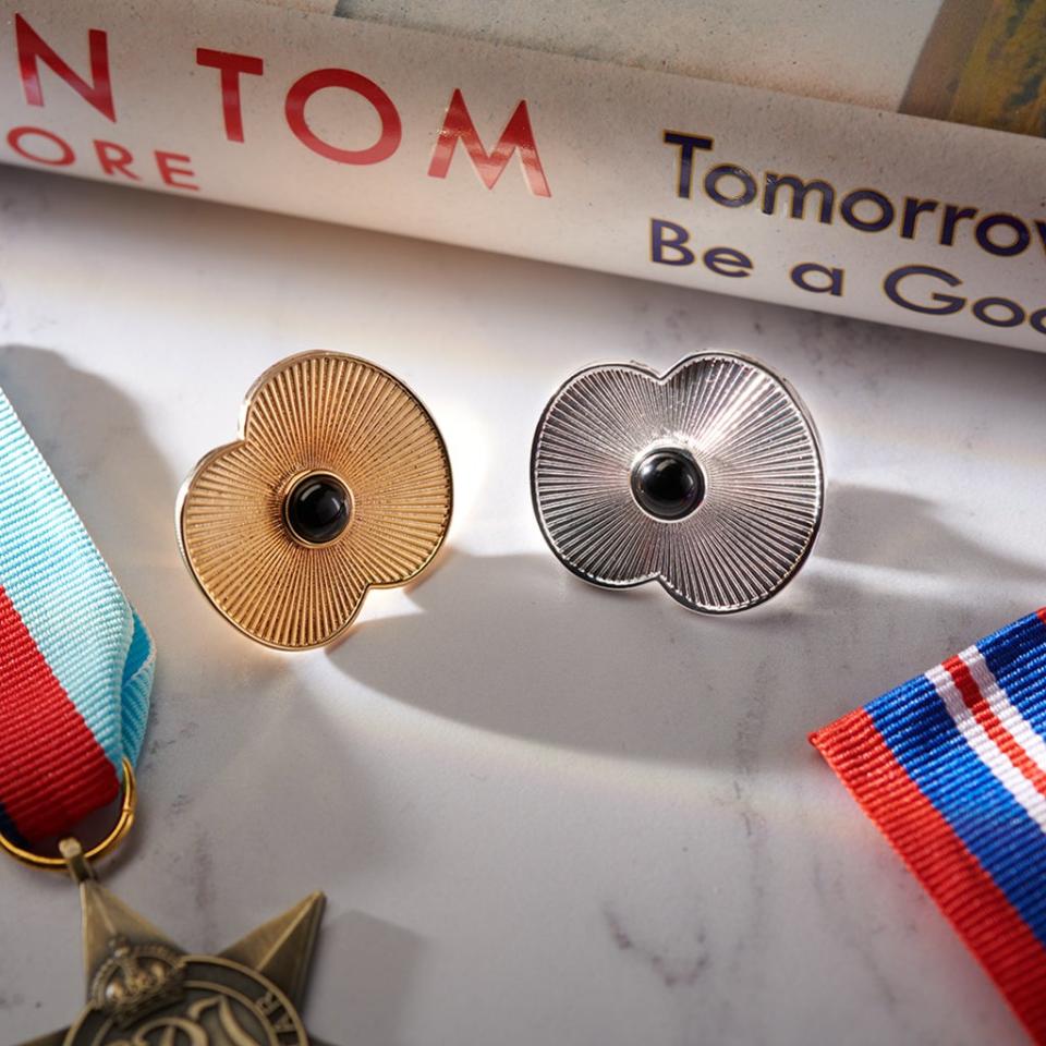 The Captain Tom poppy pins have 100 laser edged ridges to symbolise the veteran’s 100 years, his 100 laps of his garden and 100 years of the Royal British Legion charity. (Royal British Legion/ PA)