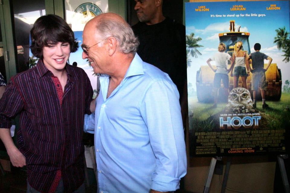 In 206, Jimmy Buffett apeared at the red carpet premiere of the movie “Hoot,” based on a Carl Hiaasen book. The event was at the Sunrise Las Olas Cinema in, Fort Lauderdale. Here, Logan Lerman, left, who stars in the film as the lead character Roy, spends a moment talking with co-producer Buffett at the premiere.