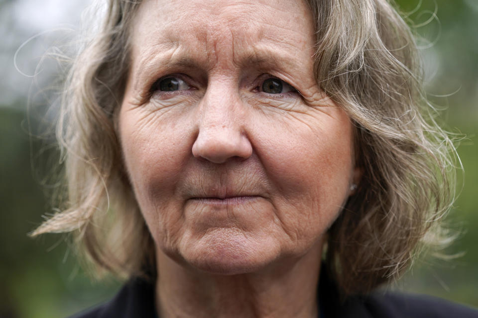 Elizabeth Whelan, sister of U.S. Marine Corps veteran and Russian prisoner Paul Whelan, speaks with reporters before a news conference with families of Americans currently being held hostage or wrongfully detained overseas in Lafayette Park near the White House, Wednesday, May 4, 2022, in Washington. (AP Photo/Patrick Semansky)