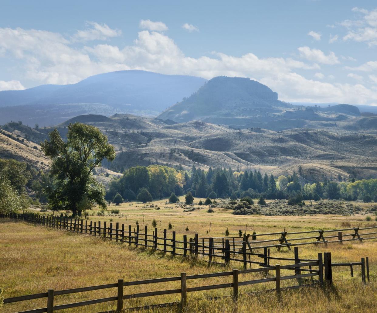 western ranch, fences and mountains