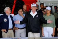 <p>President Donald Trump speaks between first lady Melania Trump and Vice President Mike Pence (L) and Senator Marco Rubio (R-FL) (2ndL) while receiving a briefing on Hurricane Irma relief efforts in Fort Myers, Fla., Sept. 14, 2017. (Photo: Jonathan Ernst/Reuters </p>