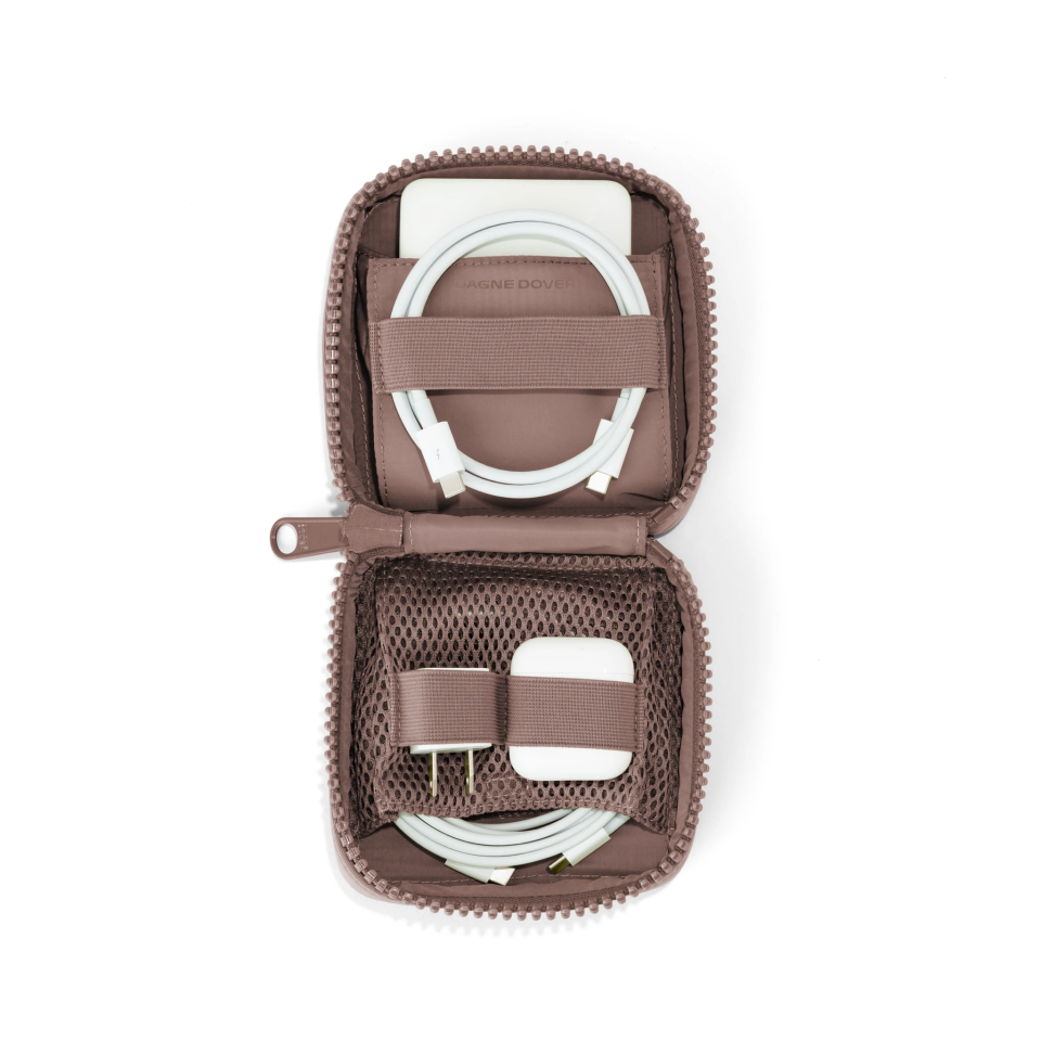 <h2>Dagne Dover Arlo Tech Pouch</h2><br>This stylish compact travel pouch made from premium neoprene and performance air mesh boasts dual compartments to keep tech accessories tangle-free.<br><br><em>Shop</em> <strong><em><a href="https://www.dagnedover.com/collections/arlo-tech-organizer?" rel="nofollow noopener" target="_blank" data-ylk="slk:Dagne Dover" class="link ">Dagne Dover</a></em></strong><br><br><strong>Dagne Dover</strong> Arlo Tech Organizer, $, available at <a href="https://go.skimresources.com/?id=30283X879131&url=https%3A%2F%2Fwww.dagnedover.com%2Fcollections%2Farlo-tech-organizer" rel="nofollow noopener" target="_blank" data-ylk="slk:Dagne Dover" class="link ">Dagne Dover</a>