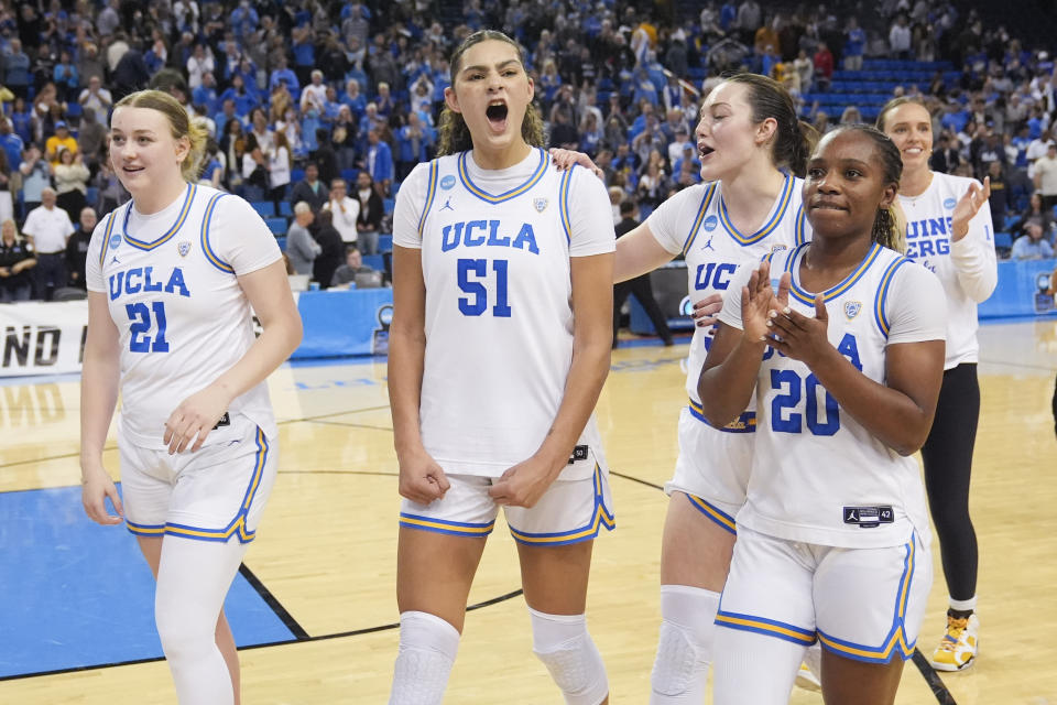 UCLA players walk off the field after a win over Creighton during a second-round college basketball game in the women's NCAA Tournament Monday, March 25, 2024, in Los Angeles. (AP Photo/Marcio Jose Sanchez)