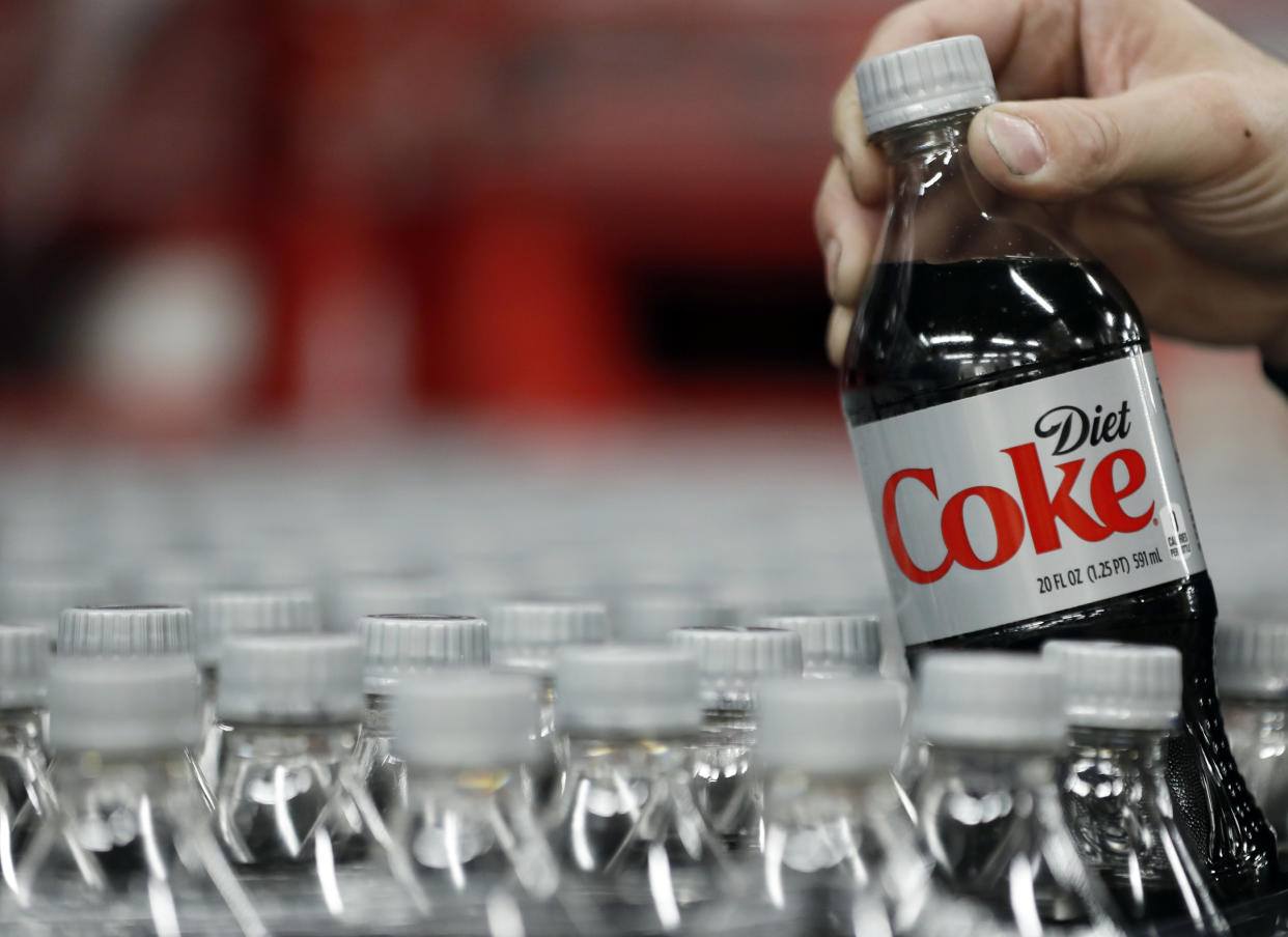 A bottle of Diet Coke is pulled for a quality control test at a Coco-Cola bottling plant in Salt Lake City, Utah (George Frey / Getty Images file )