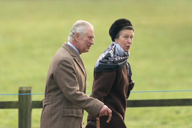 Princess Anne and King Charles walking