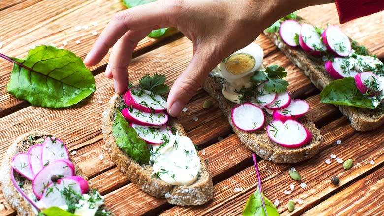 Open faced sandwiches with sliced radish