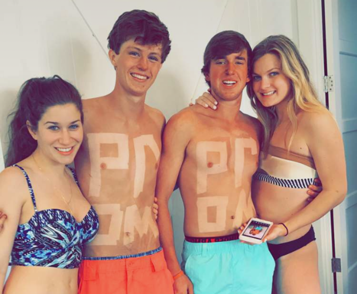Two high school students asked their girlfriends to prom by getting creative spray tans. (Photo: Snapchat)