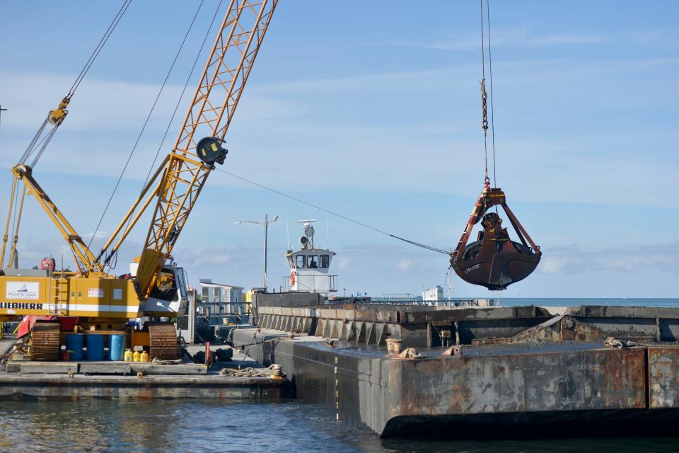 In this Nov. 15 photo, dredging at Rock Harbor continues. The harbor, shared by Orleans and Eastham, is dredged every ten years to clear the channel to the harbor, according to the Town of Eastham website. The harbor was last dredged in the winter of 2014/15 when about 25,000 cubic yards of sand was removed. The Wellfleet selectboard has voted to dredge its harbor for $3.8 million and will take on a $4.5 million penalty for not performing harbor cleanup elsewhere to offset the work.